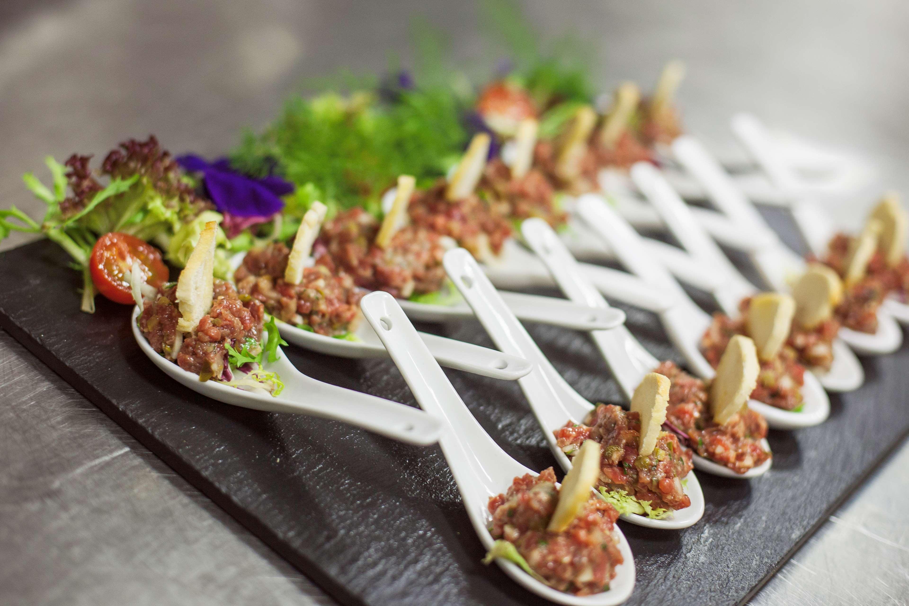 Hotel Lopez De Haro Bilbao Bagian luar foto A serving of beef tartar