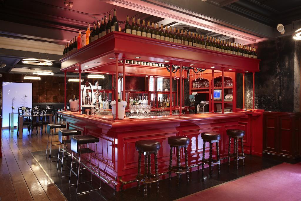 Hotel Lopez De Haro Bilbao Bagian luar foto The bar at the restaurant